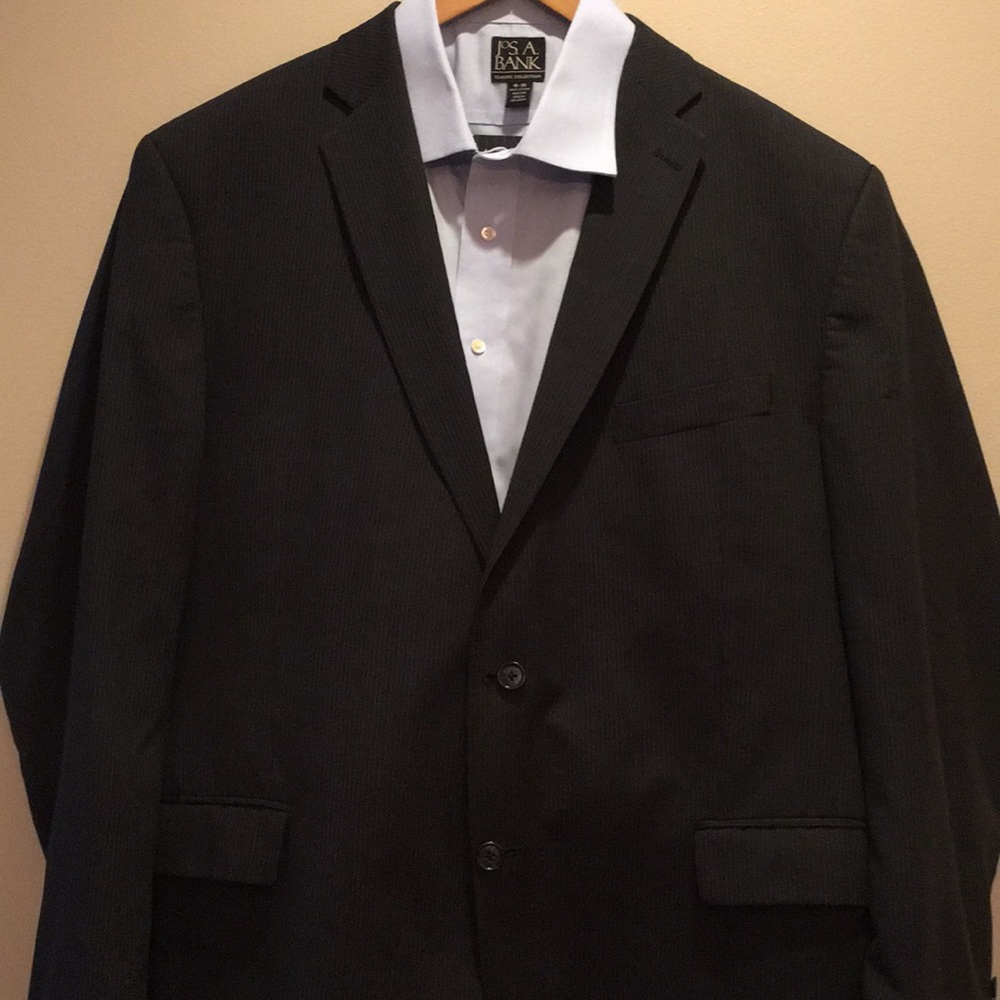Calvin Klein navy pin stripe suit